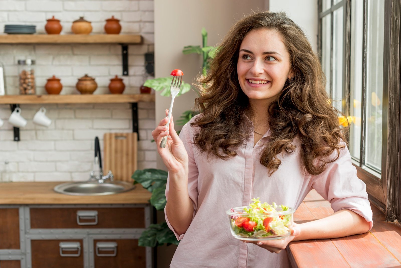 brunette-woman-eating-salad.